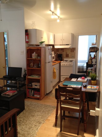 Living room kitchen - quiet, updated and centrally located 1 bedroom or studio close to campus Apartments