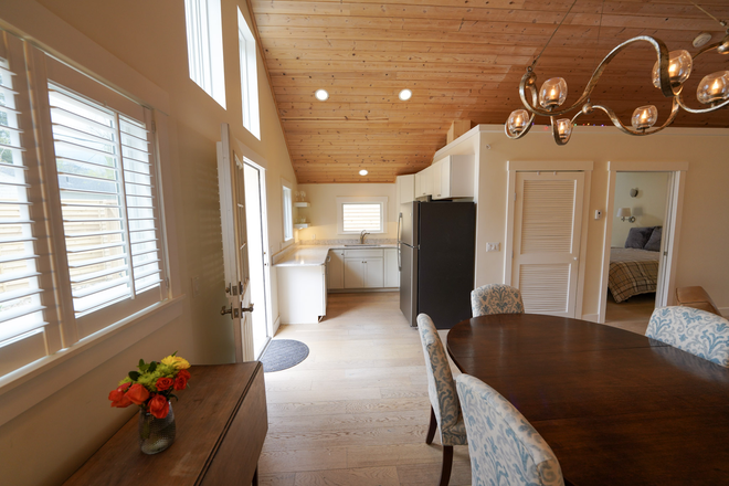 Dining Area with Kitchen in background - Cozy yet spacious 3BR, 3BA home in Newlands. Short Skip bus ride to campus.