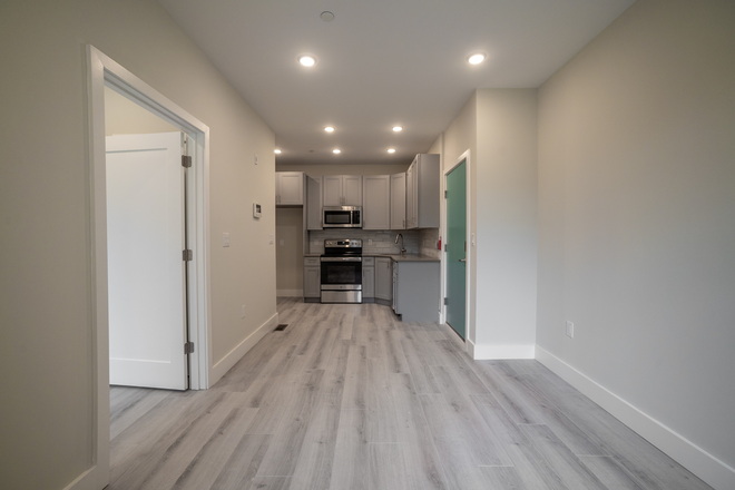 3731 Brandywine living room/kitchen - 3-bed, 3-bath apartment - 12 min walk to Drexel  - Available 9-1-2025