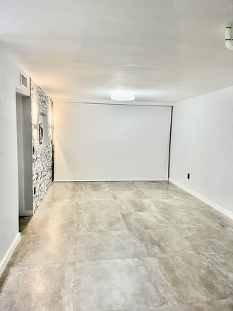 Family Room - Remodeled beautiful 1 bedroom/1.5 Bathroom Centrally Located, First floor, Assigned Parking. Condo