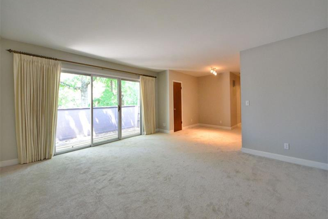 Living room with balcony - Harwood Condominium beautiful 1 Bedroom 1 Bathroom apartment on Emory Campus
