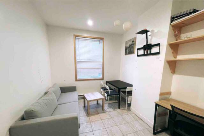 Cover - First Floor - One bedroom, Living room, Kitchen, bathroom, and small backyard Townhome