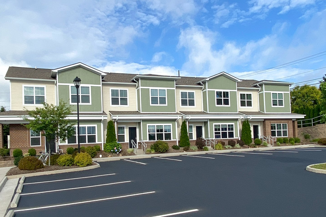 Front view of the townhomes and parking - The Edge Townhome (D5 Floorplan)