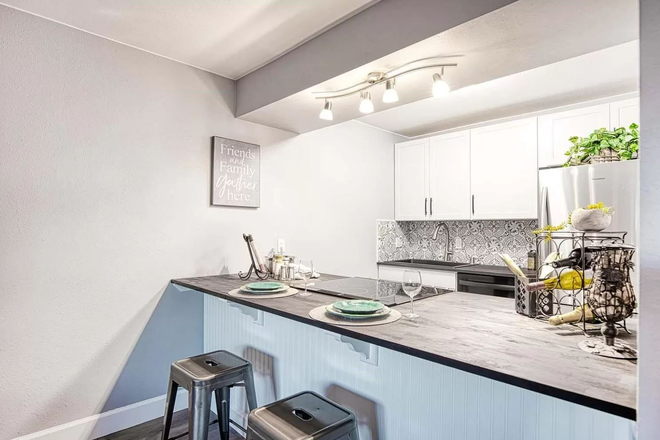 Kitchen/Counter - 2- Bedroom, fully remodeled, top floor unit with views of the mountains-close to CU and amenities Condo