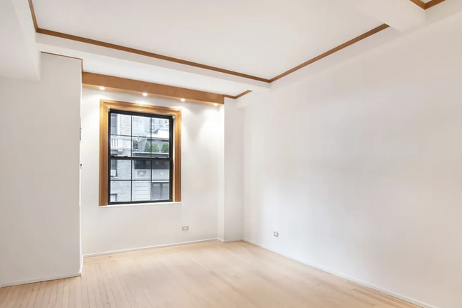 Primary Bedroom - The Meurice (2bd, 2ba) Apartments