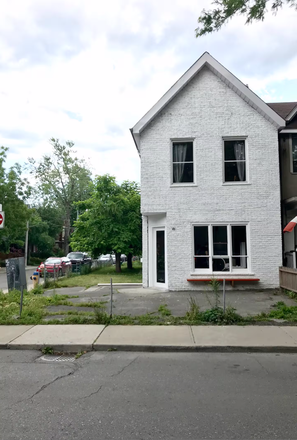 Building from Afton Avenue ( the unit on the second floor) - Bright and cozy, furnished two-bedroom flat available on west queen west neighbourhoud
