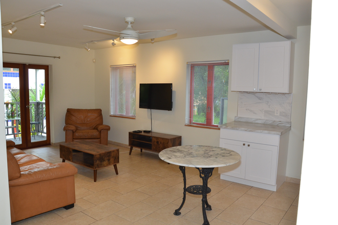 Living room - Charming Garden Apartment in the heart of North Coral Gables--for UM and FIU students