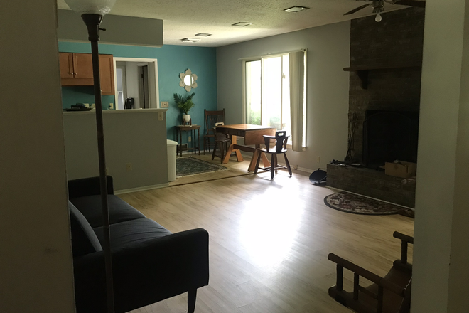 Living room with fireplace - Bedroom with private bathroom available ***January 1, 2026 House