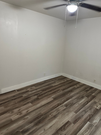New luxury vinyl flooring throughout. - Roomy recently remodeled two bedroom apartment near downtown Edwardsville and SIUE.
