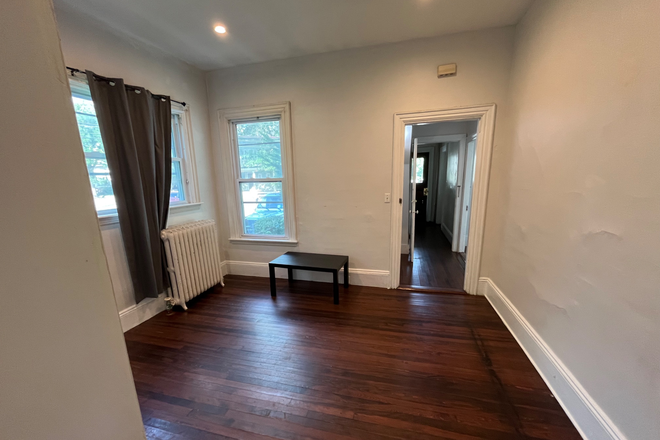 Living room - No Broker’s Fee!  Up to 5 Bedrooms available in a large 5 Bedroom Apartment Close to Campus.