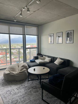 Common Living Room Area with Balcony - SUBLEASE (Female) - Spring Semester 2026