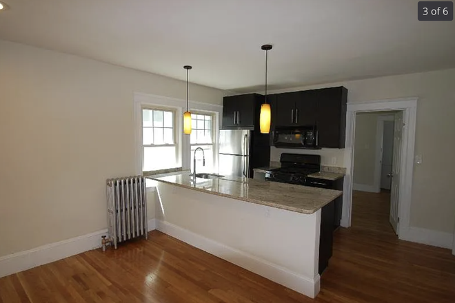 Kitchen with hallway to bedrooms behind - 3 Bedroom Apartment