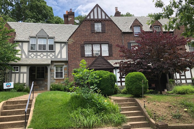 The house, front - Individual furnished bedrooms in a Sabbatical Townhouse (one room left for academic year))