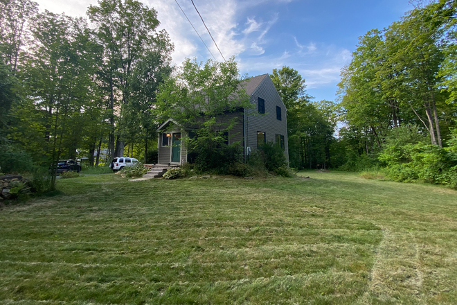 front of house from front yard - Beautiful 3BR/2BTH Home in the woods for Rent (Built in 2017)