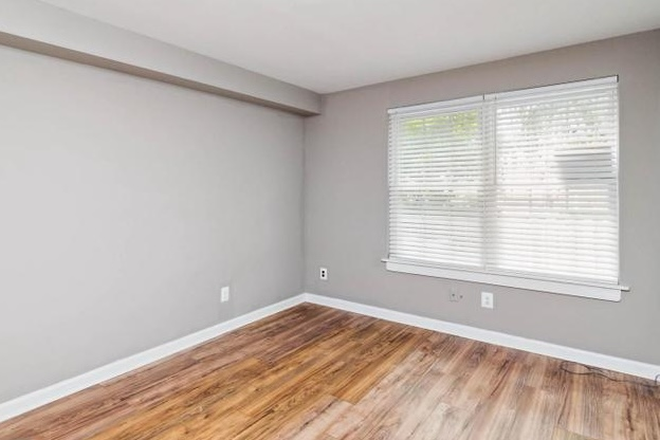 Living Area - 2 Blocks from JHH; Renovated Private Spaces with En Suites; Hopkins Security; Parking Available Townhome