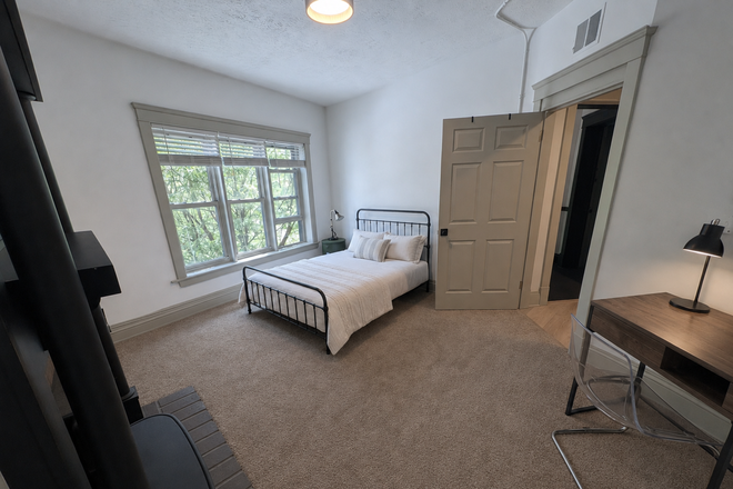 Bedroom - Fully furnished, newly renovated 3br apt — with every utility included. +washer dryer & microwave