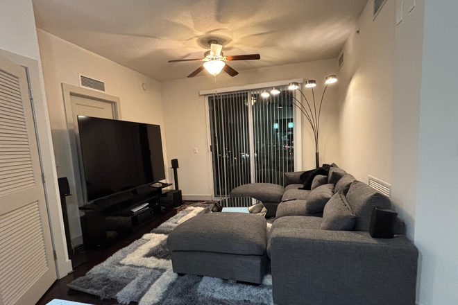 Living room - Need Roommates for Apartment in Downtown - 2 people will share 1 room