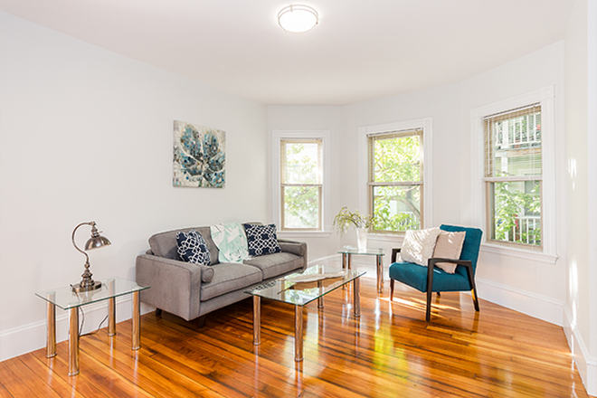 Living Room - Renovated 4-Bed Near Union Square with In-Unit Laundry Apartments