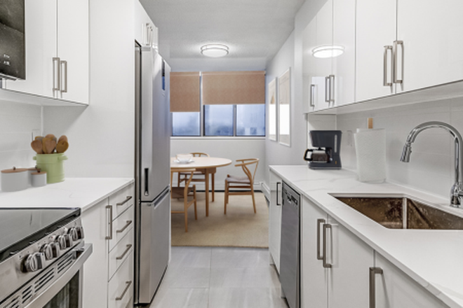 White kitchen with stainless steel appliances, breakfast nook and window - LGBTQ+ friendly, female (cis) roommate for shared 2 bdrm, 1 bath apartment
