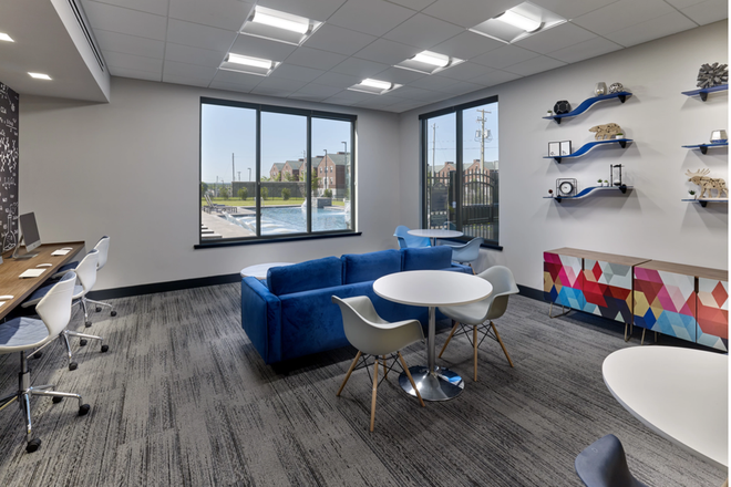 business room in the clubhouse - Campus Heights Apartments