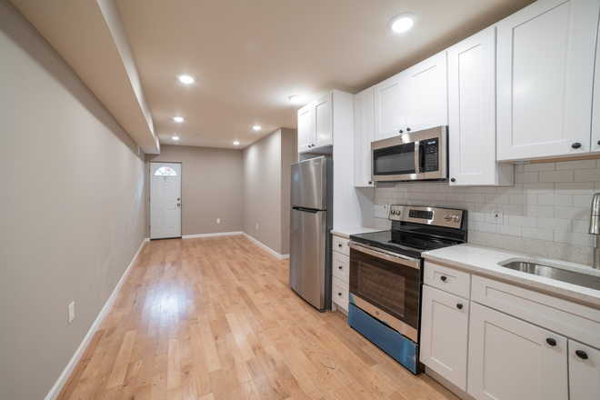 Kitchen - OCP - New Construction Luxury Unit With Patio - 3 Bed 3 Bath Apartments