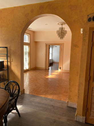 Arch Way Entry to Open Area - Spacious Home with Country Charm Close to Campus