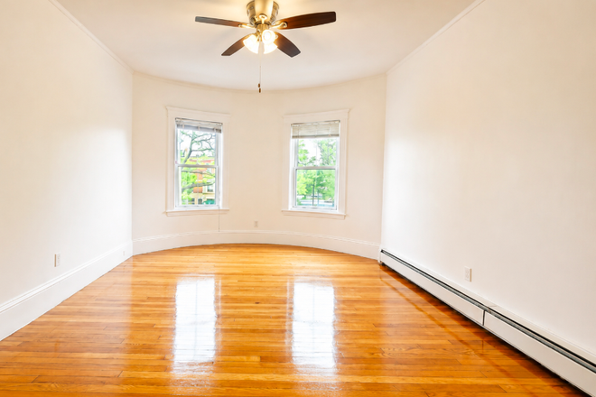 Living Room - Bright & Renovated 3 or 4 Bedroom Apartment | Front & Rear Decks | Near Transit