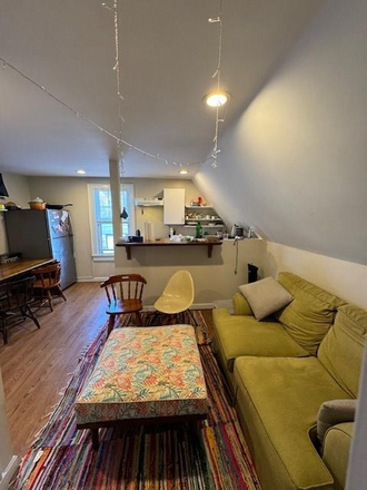 living room - Two bed, two full bathrooms Fox Point apartment with heat included.