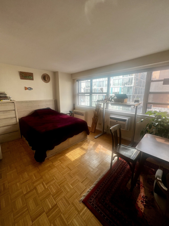 Bedroom - Sunny minimal, clean studio, lots of light, walking distance to everything Apartments