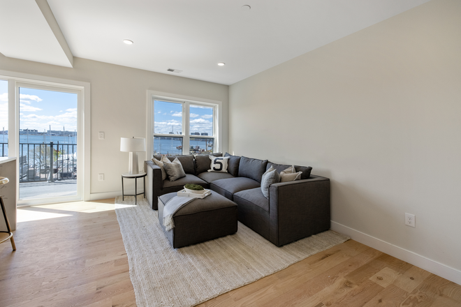 Call NOW for showings! 617-236-8600 - WEBSTER ST - LUXE WATERFRONT 4BR NEAR MBTA BLUE LINE FOR *9/1/2026* W/ 2 BATH, W/D IN UNIT, DECK! Apartments