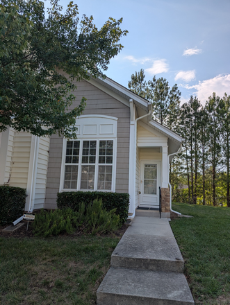 Front exterior of end unit townhouse - Refreshed townhouse in Hope Valley Farms
