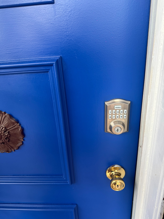 Main floor front door with code entry - Furnished 2BR & 4BR Rental Options in East Brooklyn | Flexible Lease Terms + Utilities Included Townhome