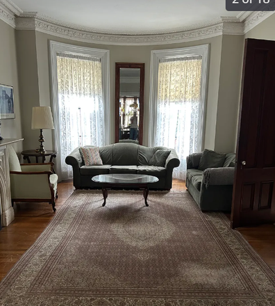 living room - Female Grad student/Young professional rooms available