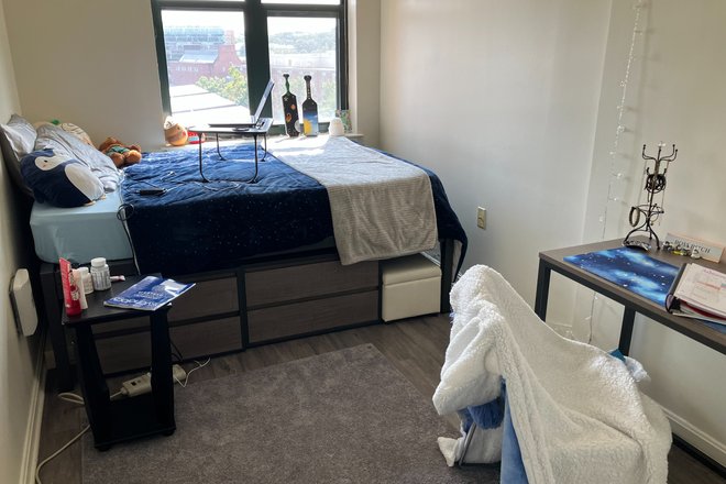 Bedroom, comes with the drawers, desk, bed! A bit larger than pictured, as you can see from the desk being cut off. - UView Apartment for Summer Sublease (potential to renew!)