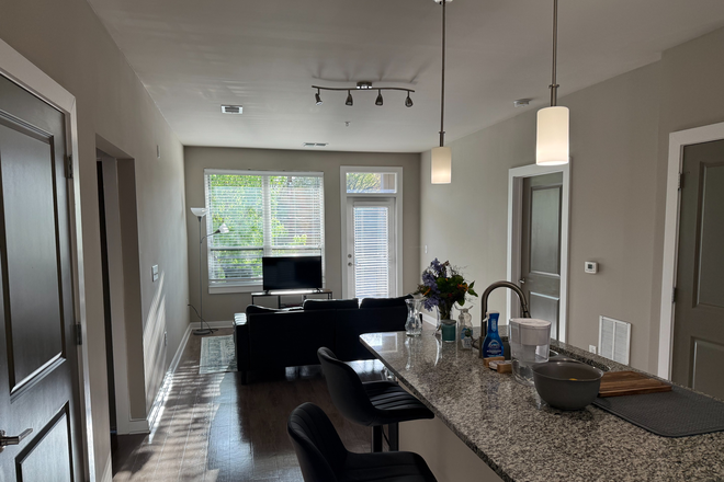 Kitchen Table and Living Room - 810 9th St Apartments, Looking for 1 Roommate, 2-Bed/2-Bath