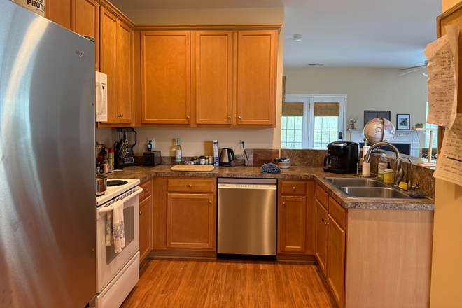 Kitchen with new dishwasher and refrigerator, stove/oven, garbage disposal, full size washer and dryer. - 3 bedroom 2 bath lovely Johns Island home with fenced yard