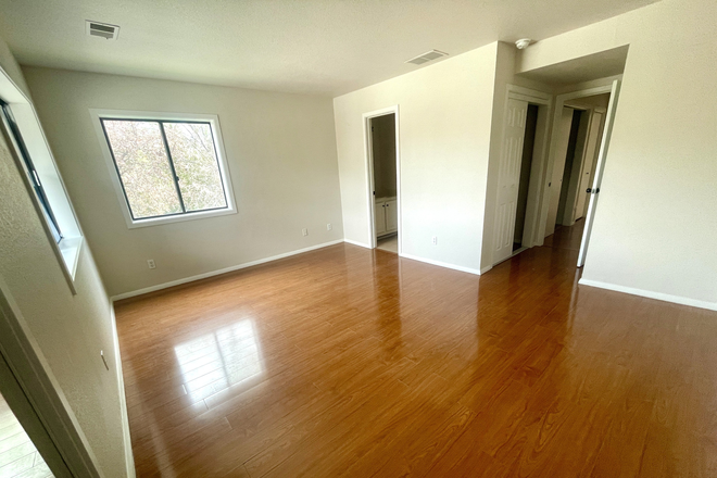 Available bedroom (east-facing window overlooks creek and trees) - Spacious room in 2BR/2BA townhouse