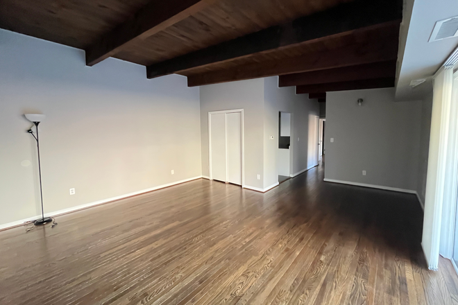 Living room - A cozy and spacious two-bedroom in New Carrollton, MD.