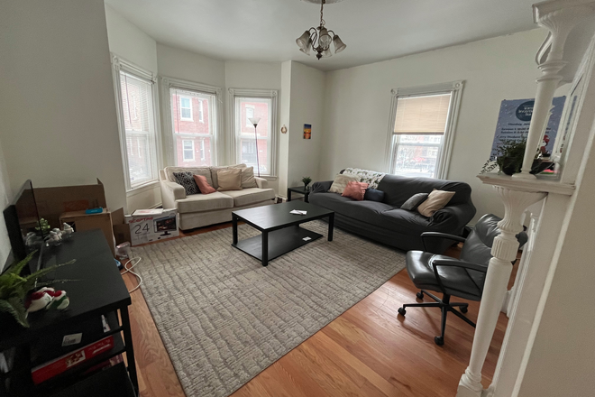 Living Room - Three Bedroom apartment with two Full bathrooms and central air conditioning