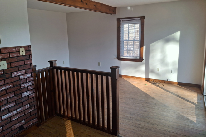 Living Room - Easy Uconn Commute! HEAT AND ELECTRICITY INCLUDED! Apartments