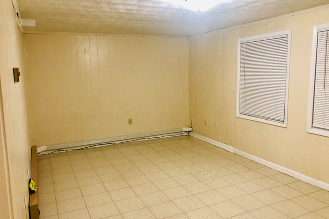 "Basement" downstairs bedroom - HUGE with door to patio - Room for rent in shared female townhouse Individual leases