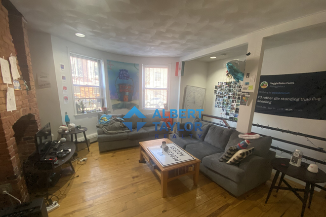 Living Area - Legacy 6 Bedroom Apartment Available ACROSS ISEC!! Tour Today