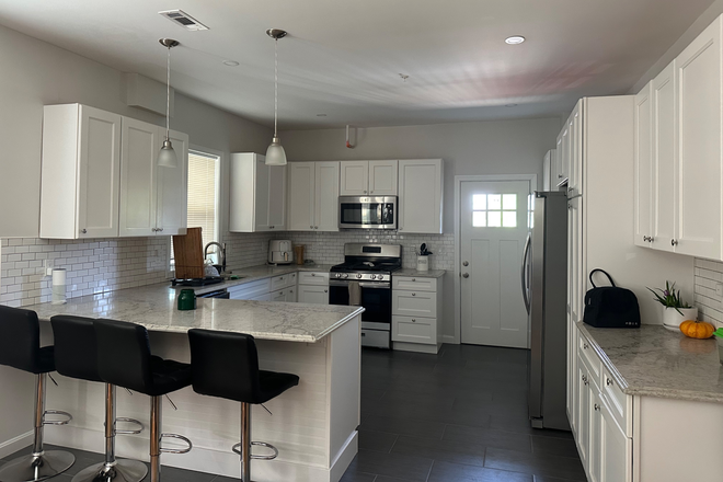 Kitchen/dining bar - 3 month sublet of private room in a 3bed/2bath