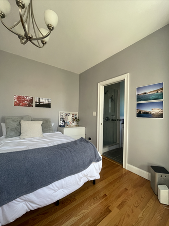Bedroom - Spacious 4-bedroom, 2-bath luxury apartment with in-unit laundry and central air