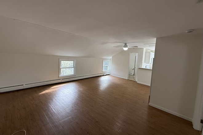 Living room dining area - Apartment downtown Port Jefferson NY
