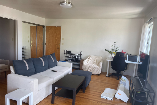 living room - Top-Floor Apartment with Two Private Patios Close to Campus