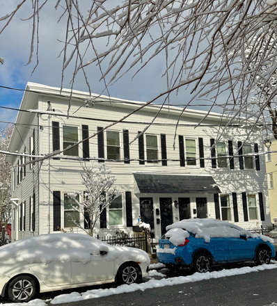front of house - Sunny, renovated apt in condo bldg w/yard, just off Beacon St on Cambridge line
