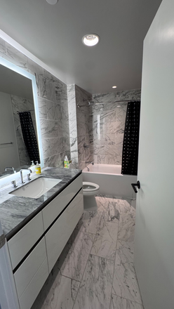 Master bathroom part of the owner suite with a full walk-in closet - Luxury 2BR/2BA at The Pierce in Rosslyn – Minutes to Georgetown Condo