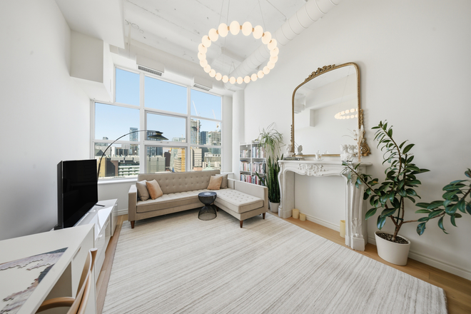 Living Room - Elegant 12‑Ft Ceiling Hard Loft - Sunset Views, Parking & Turnkey Living
