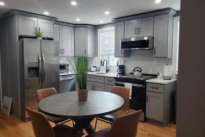 Kitchen - Newly renovated 5BR 2 full BA near campus! Apartments